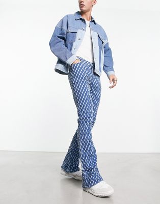 ASOS DESIGN stretch flare jeans with all over distressing in blue