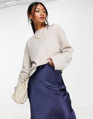 ASOS DESIGN super soft oversized sweater with pocket detail in warm cream-White