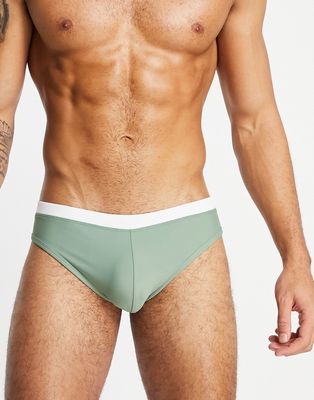 ASOS DESIGN swim briefs with contrast white tipping in pastel green