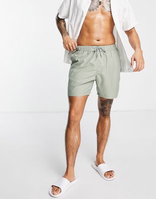 ASOS DESIGN swim shorts in mid length in light khaki-Green