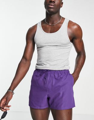 ASOS DESIGN swim shorts in short length in dark purple