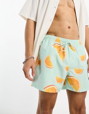 ASOS DESIGN swim shorts in short length in orange print-Multi