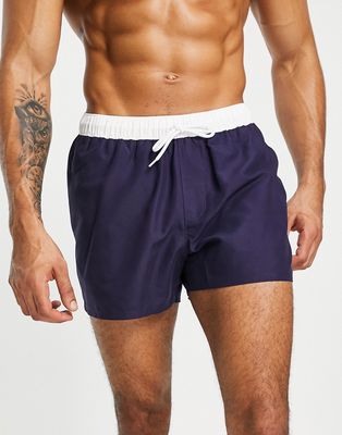 ASOS DESIGN swim shorts in short length with white tipping in navy-Multi