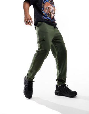 ASOS DESIGN tapered cargo sweatpants with toggle in khaki-Green