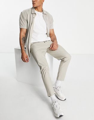 ASOS DESIGN tapered chinos in light beige-Neutral