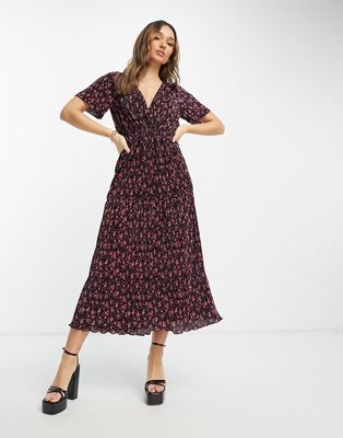 ASOS DESIGN tiered wrap front midi plisse dress in pink and black ditsy