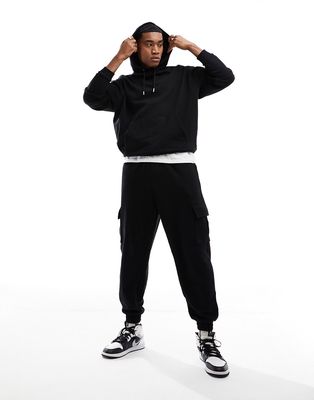 ASOS DESIGN tracksuit with oversized hoodie and relaxed sweatpants in black