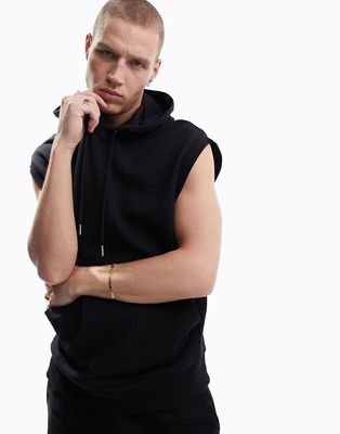 ASOS DESIGN tracksuit with oversized sleeveless hoodie & slim shorts in black