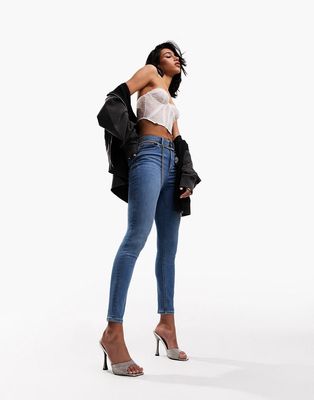 ASOS DESIGN ultimate skinny jeans in mid blue