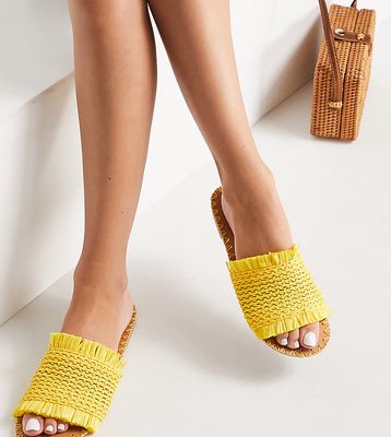 ASOS DESIGN Wide Fit Features woven raffia mules in yellow