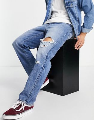 ASOS DESIGN wide straight leg jeans in mid wash with rips-Blue