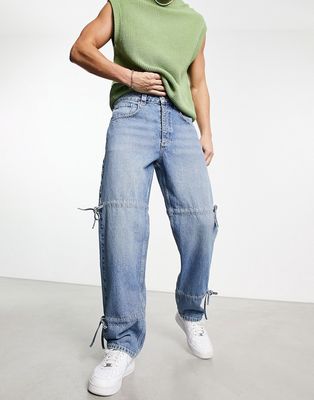 ASOS DESIGN wide straight leg jeans with tie details in mid wash blue