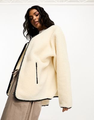 ASOS DESIGN zip through borg with faux leather trim detail in neutral