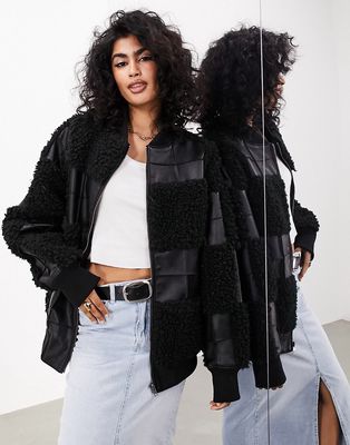 ASOS EDITION oversized faux leather patchwork bomber jacket in black