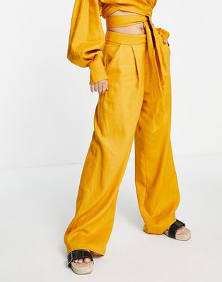 ASOS EDITION pleat front linen wide leg pants in mustard-Yellow