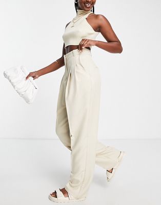 ASOS EDITION pleat waist tapered pants in stone-Neutral