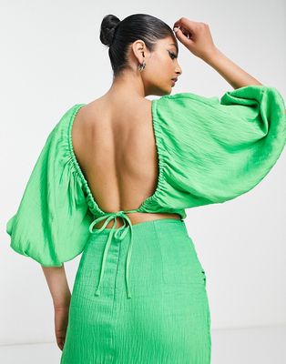ASOS EDITION textured blouson crop top with tie back in bright green