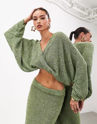 ASOS EDITION twist detail knit semi sheer long sleeve top in moss green