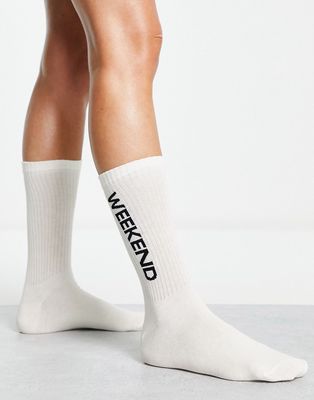 ASOS Weekend Collective calf length rib socks with horizontal split logo in white