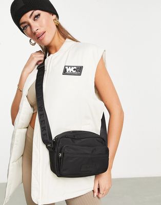 ASOS Weekend Collective nylon cross body bag in black