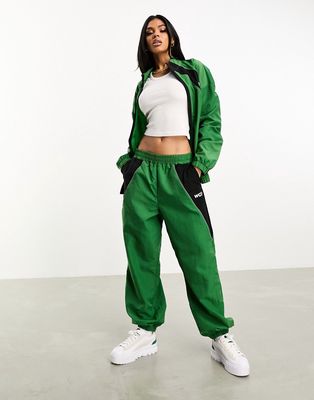 ASOS Weekend Collective nylon sweatpants in green
