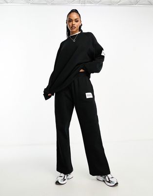 ASOS Weekend Collective oversized sweatpants with woven label-Black