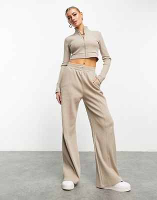 ASOS Weekend Collective straight leg waffle sweatpants in neutral