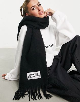 ASOS Weekend Collective woven fluffy tassel scarf with logo in black
