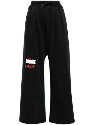 AVAVAV logo-print flared track pants - Black