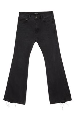 Balenciaga Distressed Hem Slim Fit Jeans in Rubber Black