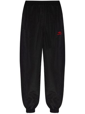 Balenciaga logo-embroidered cotton track pants - Black