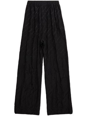 Balenciaga logo print wide-leg trousers - Black