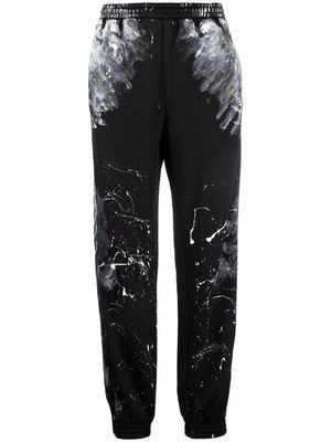 Balenciaga paint splatter track pants - Black