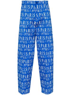 Balenciaga Paris print tailored trousers - Blue