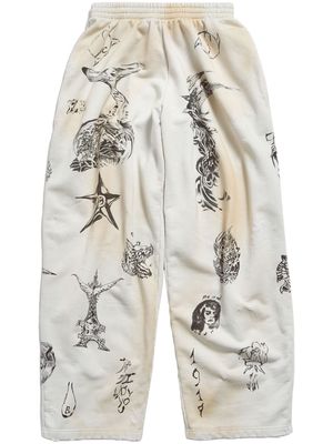 Balenciaga Tat graphic-print cotton track pants - Neutrals