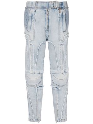 Balmain exposed-hem panelled jeans - Blue