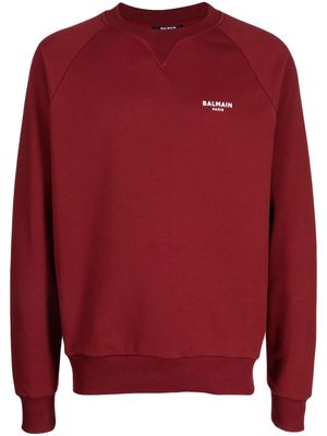 Balmain flocked-logo cotton raglan sweatshirt - Red