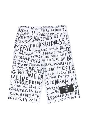 Balmain Kids cotton graphic-print knee shorts - White