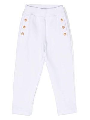 Balmain Kids embossed-buttons track pants - White