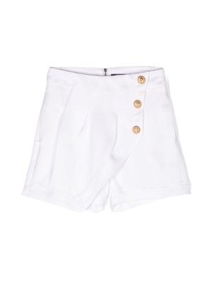 Balmain Kids lion-head embossed-buttoned shorts - White