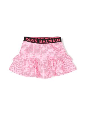 Balmain Kids monogram-pattern logo-waistband skirt - Pink