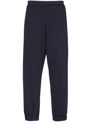 Balmain monogram-pattern elasticated-waistband track pants - Blue