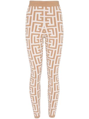 Balmain monogram-pattern metallic effect leggings - Brown