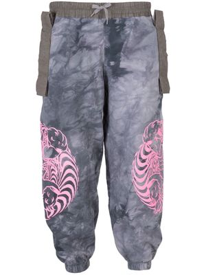 Bernhard Willhelm tie-dye pattern track pants - Grey