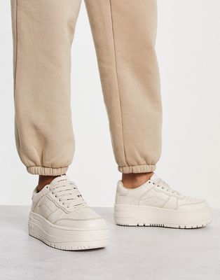 Bershka chunky flatform sneakers in bone-White