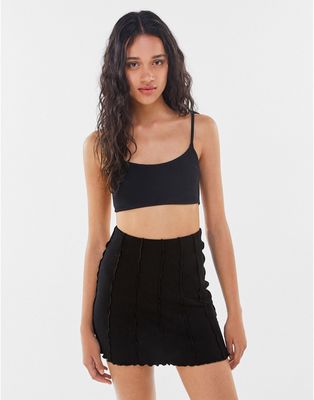 Bershka cotton exposed seam mini skirt in black - BLACK