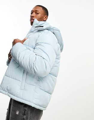 Bershka hooded puffer jacket in blue