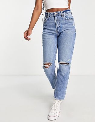Bershka mom jeans with rip in blue