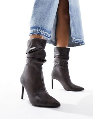 Bershka slouchy heeled boots in washed brown
