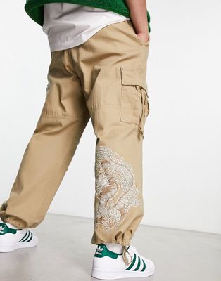 Bershka tiger embroidered cargo pants in camel-Neutral